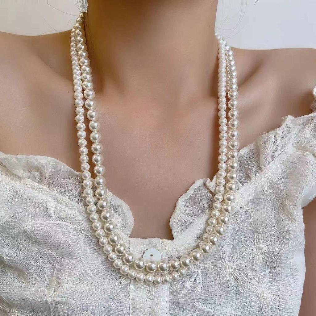 Elegant Magnetic Pearl Clavicle Necklace – High-End Versatile Sweater Chain for Women