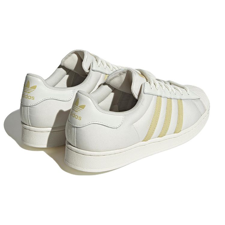 adidas Оригинальные кроссовки Superstar Кроссовки унисекс Белый Желтый IE1830