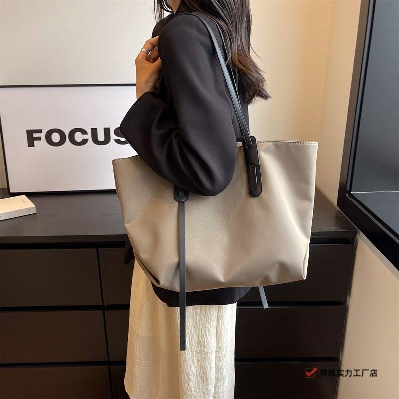 Premium casual tote bag new portable versatile explosive big bag fashionable commuter shoulder women's bag