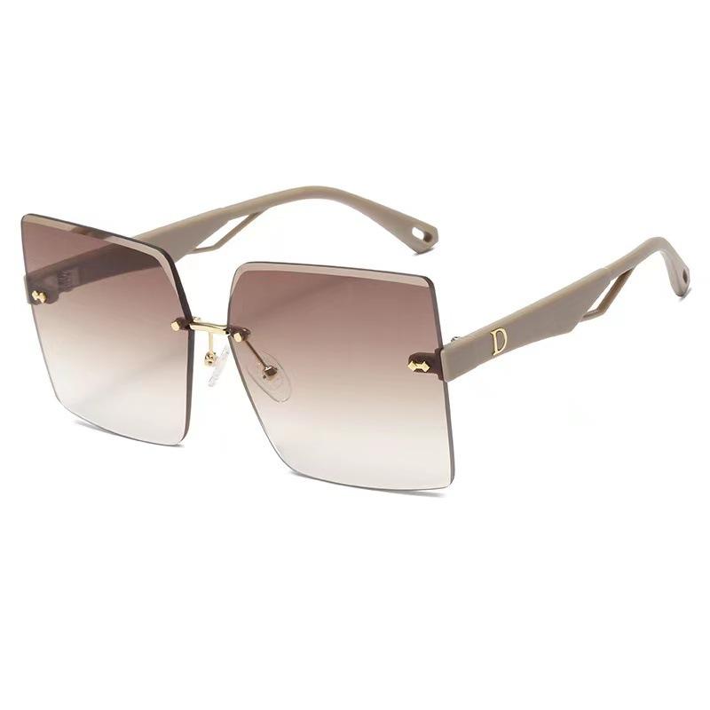 Hot-selling fashion temperament sunglasses European and American trend glasses trimmed frameless sunglasses polygonal sunshades