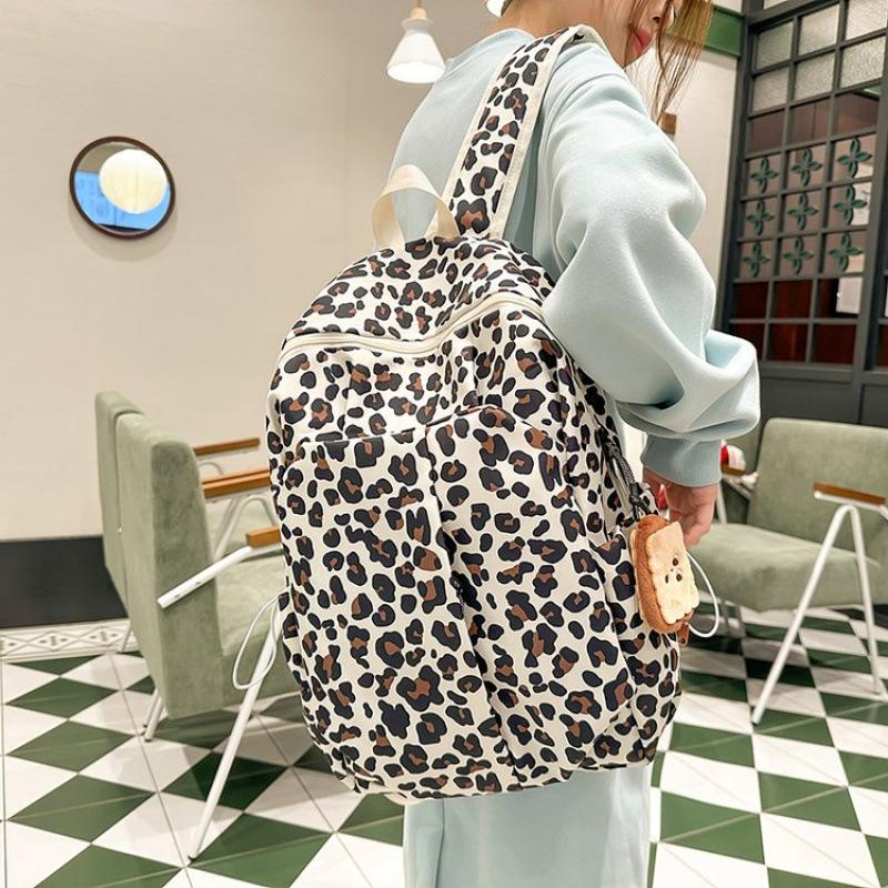 Schoolbag new junior high school girls large-capacity backpack pink leopard print high-value ins wind niche schoolbag casual backpack