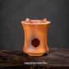 Керамический чайник из вулканического камня и угольная плита