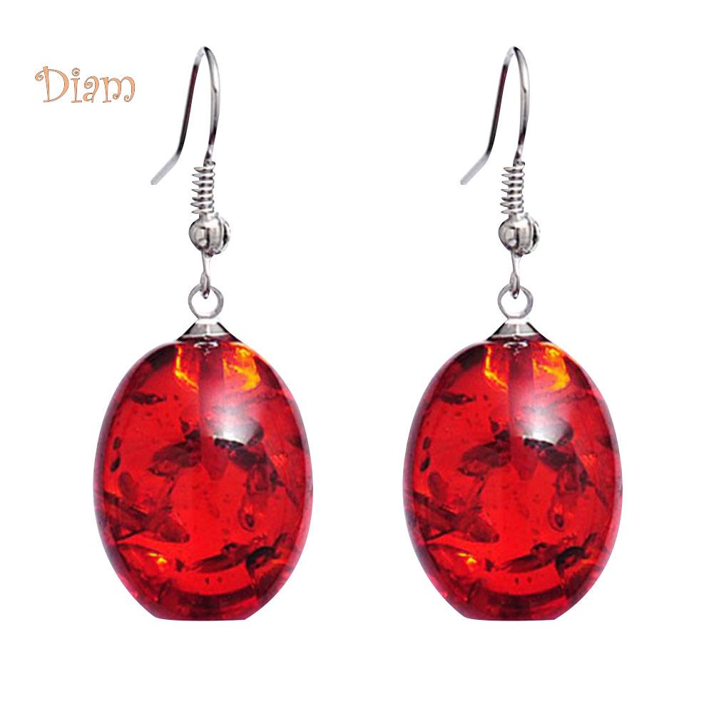 Овальные висячие серьги из искусственного янтаря