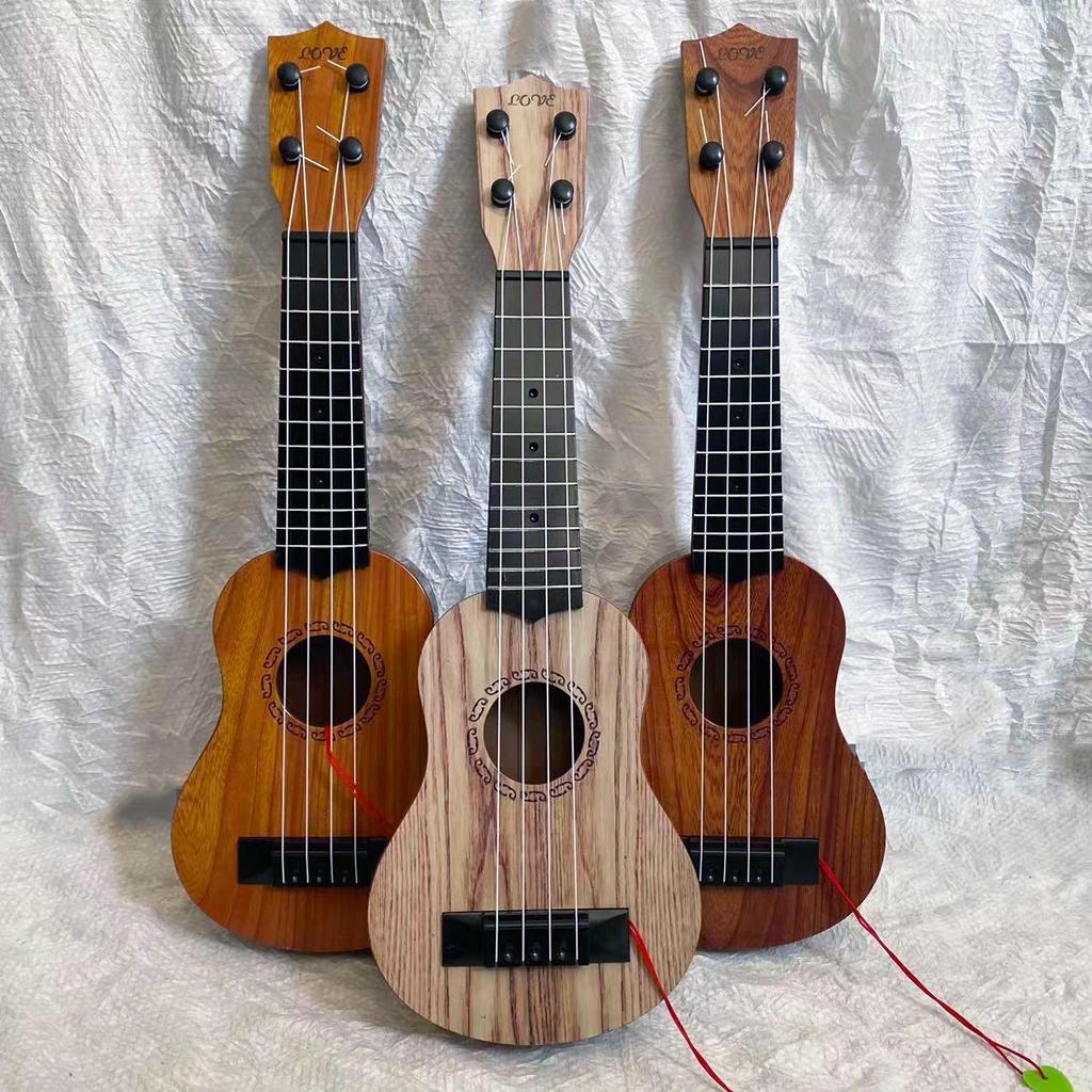 Children's Small Ukulele Guitar Toy - Functional Musical Instrument for Boys and Girls