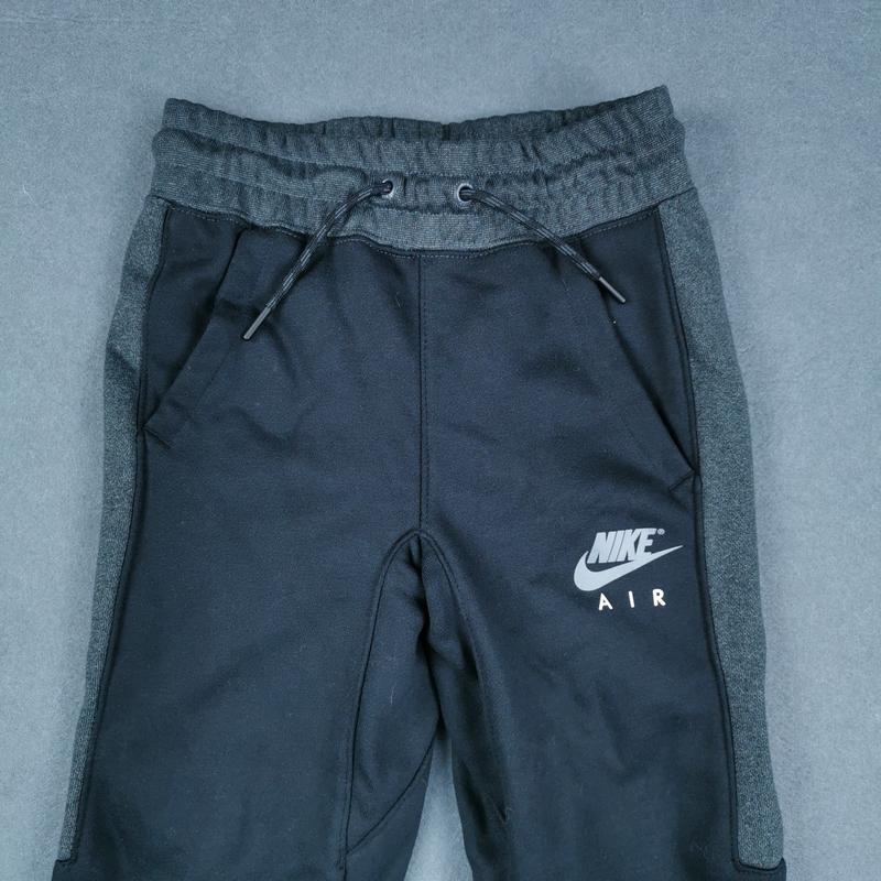 Nike Спортивные брюки Nike SwooshAir из вязаного материала, серия Sports Lifestyle, с флисом, утолщенные, с манжетами, дышащие, повседневные, для детей, черные AR7301-010