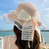 Small fresh and sweet seaside bow mesh sand sunscreen straw hat wavy ribbon fashion streamer large brim sun hat