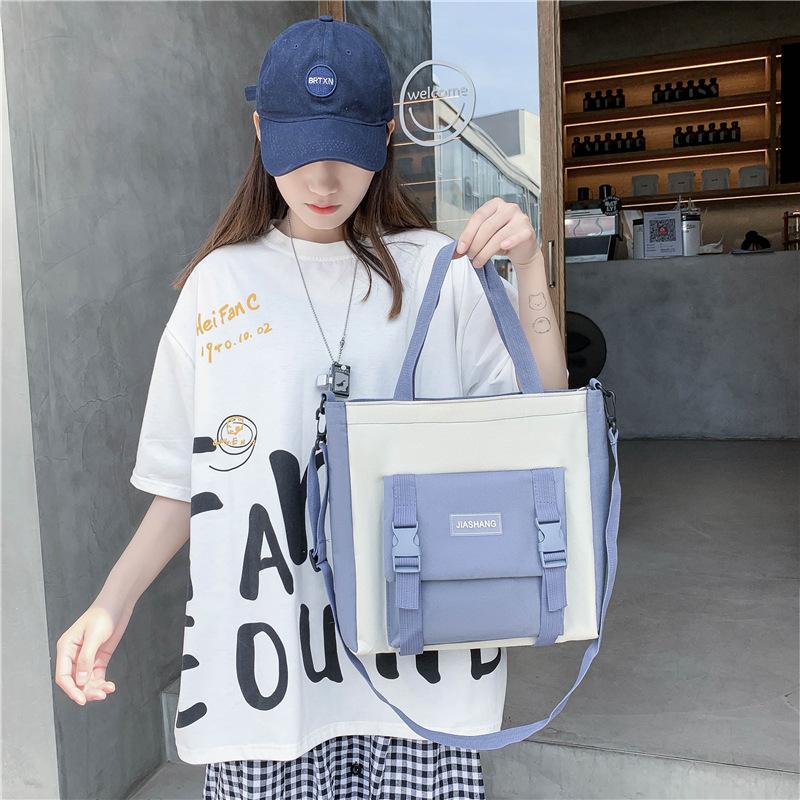 Модный многоцелевой рюкзак из четырех предметов для школьников младших и старших классов на кампусе. Школьный рюкзак. Новый студенческий рюкзак с подвеской в ​​виде медведя на груди.