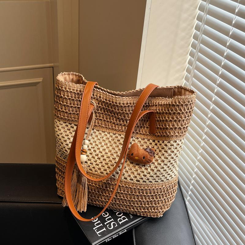 Пляжная соломенная сумка в праздничном стиле, женская летняя новая плетеная сумка с полым узором, большая вместимость, для поездок на работу, на плечо, подмышку