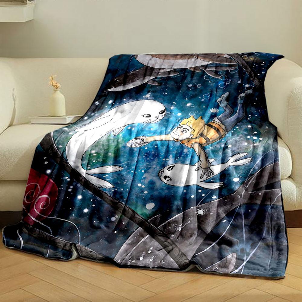 A boy swims underwater with seals amid bubbles and a colorful backdrop. for all seasons blanket lunch break throw gift