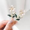 A Gardenia Brooch Exudes A High-end Niche and Light Luxury Vibe for Women It Is A Versatile Badge and Accessory for A Suit Jacket