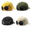 Pilot-style personality glasses and baseball cap