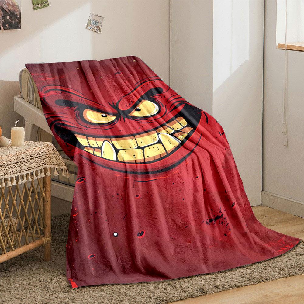 A menacing red face with sharp teeth, angry eyes, and bold expressions. for all seasons blanket lunch break throw gift