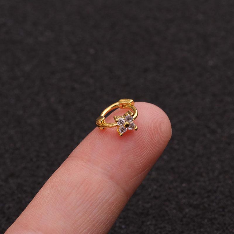 Изысканные маленькие серьги в хрящ с камнем