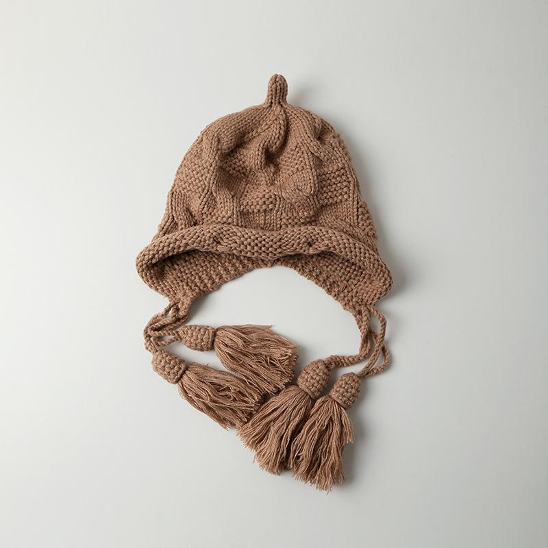 Autumn and winter new tassel pendant knitted hat red thin cute wool hat street warm windproof ear hat
