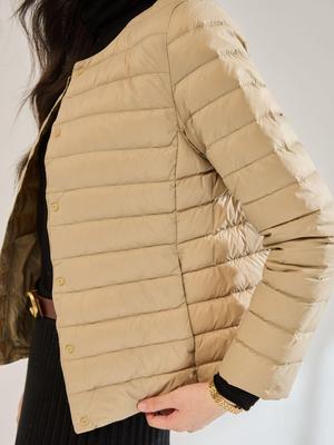 Женская легкая теплая зимняя куртка с круглым вырезом на белом утином пуху 22677