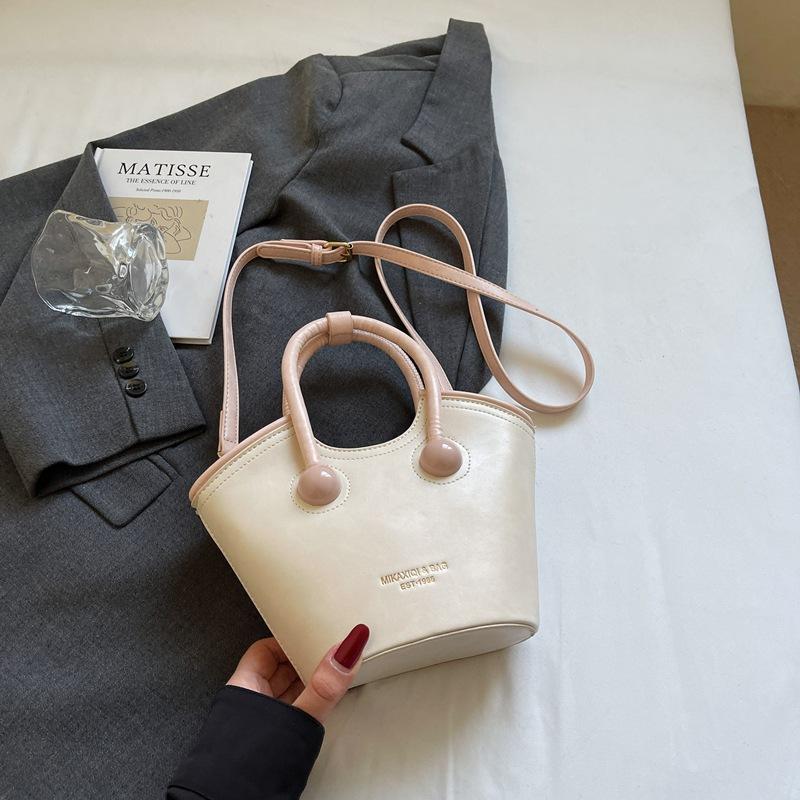 Корейская нишевая сумка женская 2025 новая весна и лето универсальная сумочка популярная одноплечевая сумка-мессенджер сумка-ведро