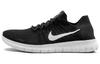 Женская модель Free Rn Flyknit 2017, черно-бело-антрацитовый цвет, артикул 880844-001.