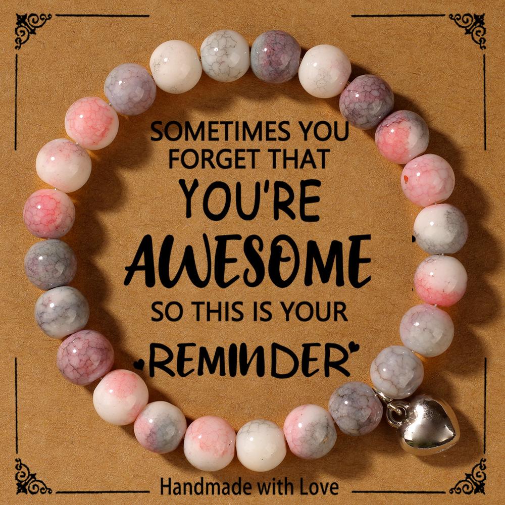 Imitation pink zebra stone glass bracelet, women's love pendant, encouragement card, pink bracelet, round bead jewelry.