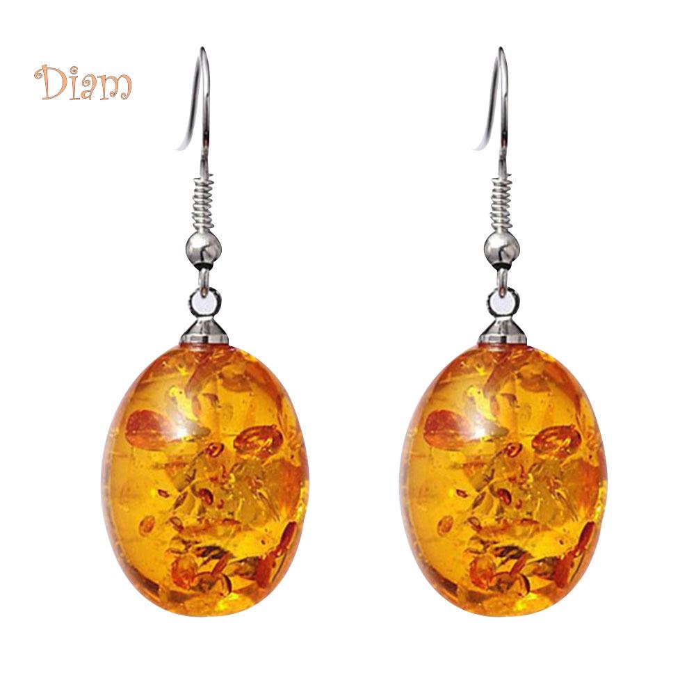 Овальные висячие серьги из искусственного янтаря