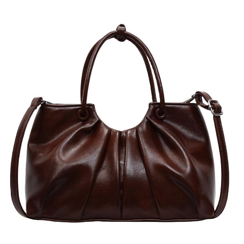 Корейская версия нишевой дизайнерской плиссированной сумки в иностранном стиле, женская универсальная сумка-мессенджер для通勤 из масляной вощеной кожи с чувством стиля