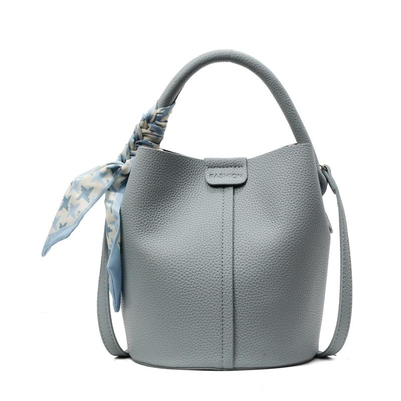 Korean fashion and simplicity Ou Ruofeng casual versatile portable bucket bag women's commuting advanced sense messenger child and mother bag