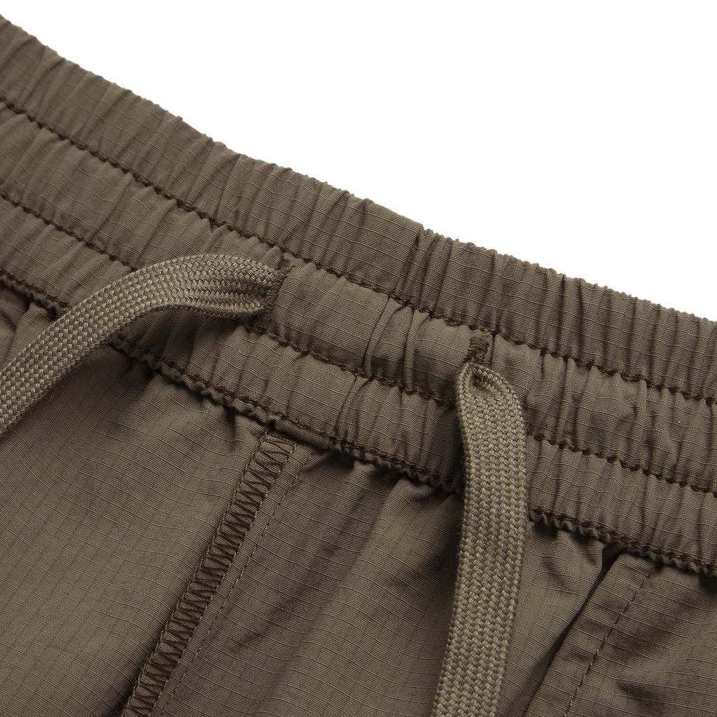 Li Ning Fitness Series Ретро Восточный стиль Средняя талия Прямые свободные тканые спортивные повседневные брюки с большим карманом Женские брюки тиково-коричневые AYKU744-2