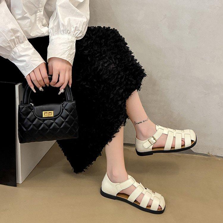 Retro Woven Baotou Sandals Women's Summer 2025 New Fashion Hollow Pig Cage Shoes Flat-soled Soft-soled Casual Roman Shoes