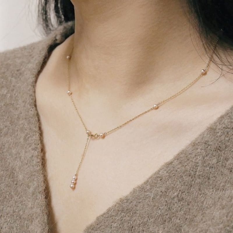 Меньше значит больше Y ЖЕМЧУЖНОЕ ОЖЕРЕЛЬЕ С ЗОЛОТЫМ НАПОЛНЕНИЕМ 14К