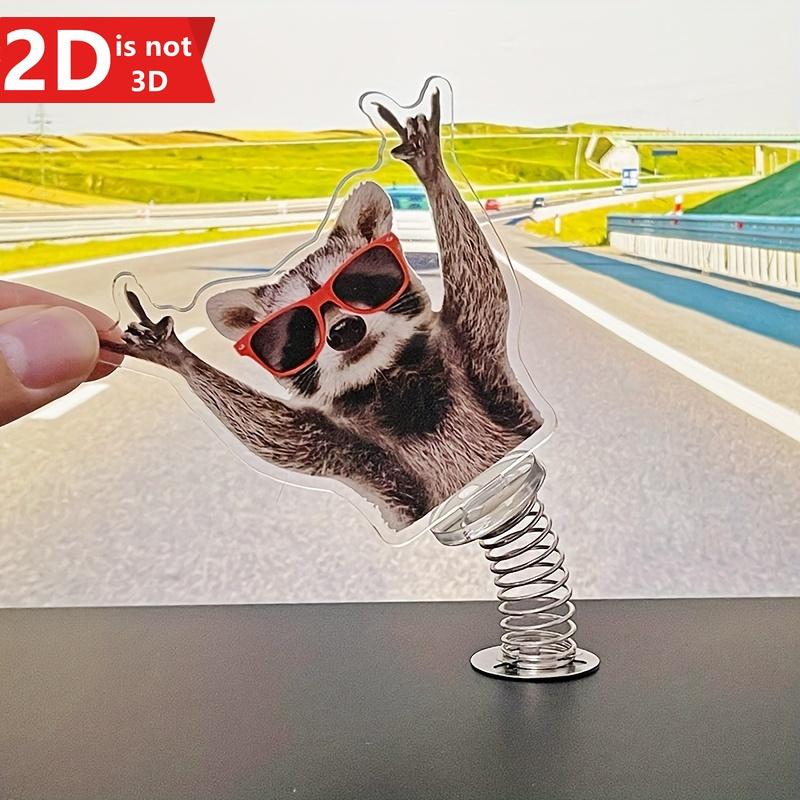 Cute 2D Swinging Raccoon, a Spring-driven Decoration for Desktops and Car Interiors.