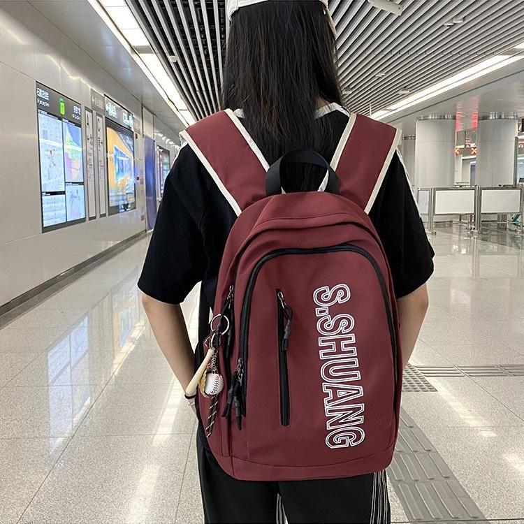 Schoolbag Korean version of the letter simple casual load reduction ridge protection versatile large capacity schoolbag junior high school student