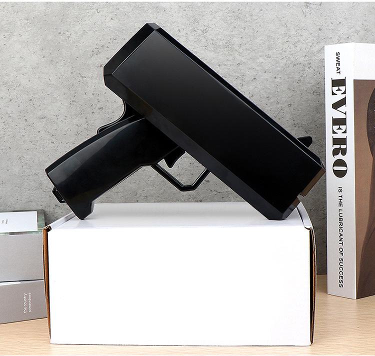 Кросс-бордерная денежная пушка с электроприводом и индивидуальным логотипом: Игрушечный реквизит "Банкнота с плевком доллара"