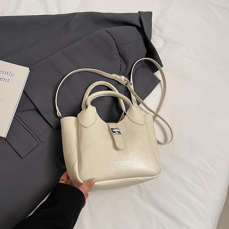 Высококлассная портативная сумка-ведро в иностранном стиле женская 2025 новая модная весенне-летняя популярная корейская версия на плечо сумка-мессенджер