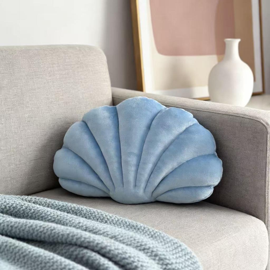 A seashell-shaped pillow, suitable for living room sofas, bedrooms, offices, and home decor.