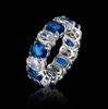 High imitation artificial colored treasure ring, red and blue, pink diamond ring, light luxury wide version egg-shaped ring.
