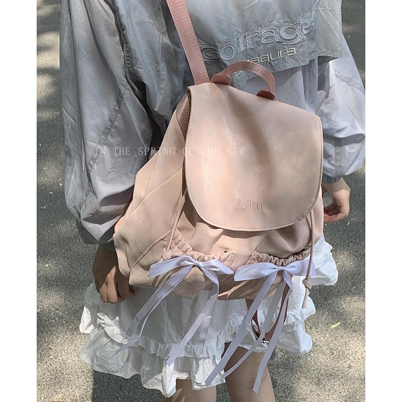 Повседневный рюкзак с бантом из нейлоновой парусины, женская сумка, новый нишевый рюкзак 2025, простая дорожная сумка