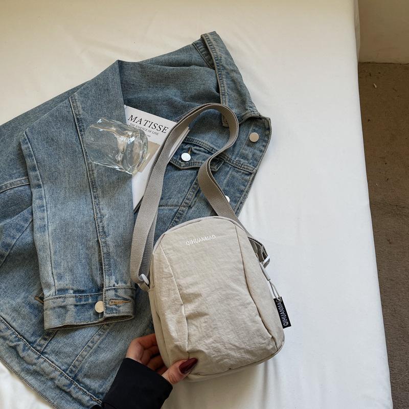 Versatile small bag Crossbody bag Women's casual canvas bag Light commuter cloth bag Men's mobile phone bag