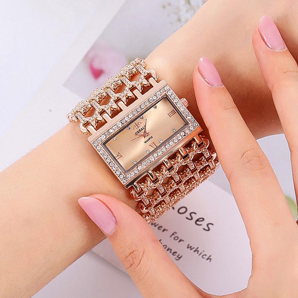 Женские кварцевые часы с широким ремешком