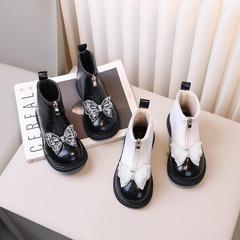 Детские теплые туфли принцессы, нескользящие модные ботинки для девочек с милым бантом, новинка 2024 года, детские короткие кожаные ботинки с молнией спереди