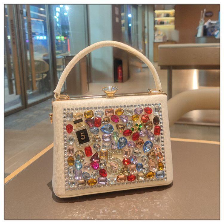 Light Luxury New Leather Fashionable Rhinestone Retro Clip Niche Handbag