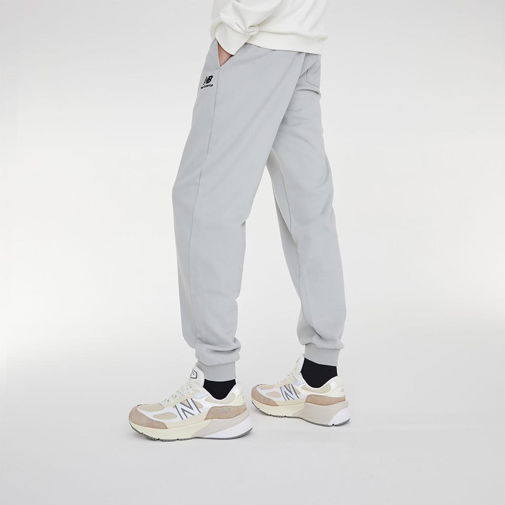 New Balance Трикотажные брюки унисекс серые с умеренной манжетой 6LD38101-GR