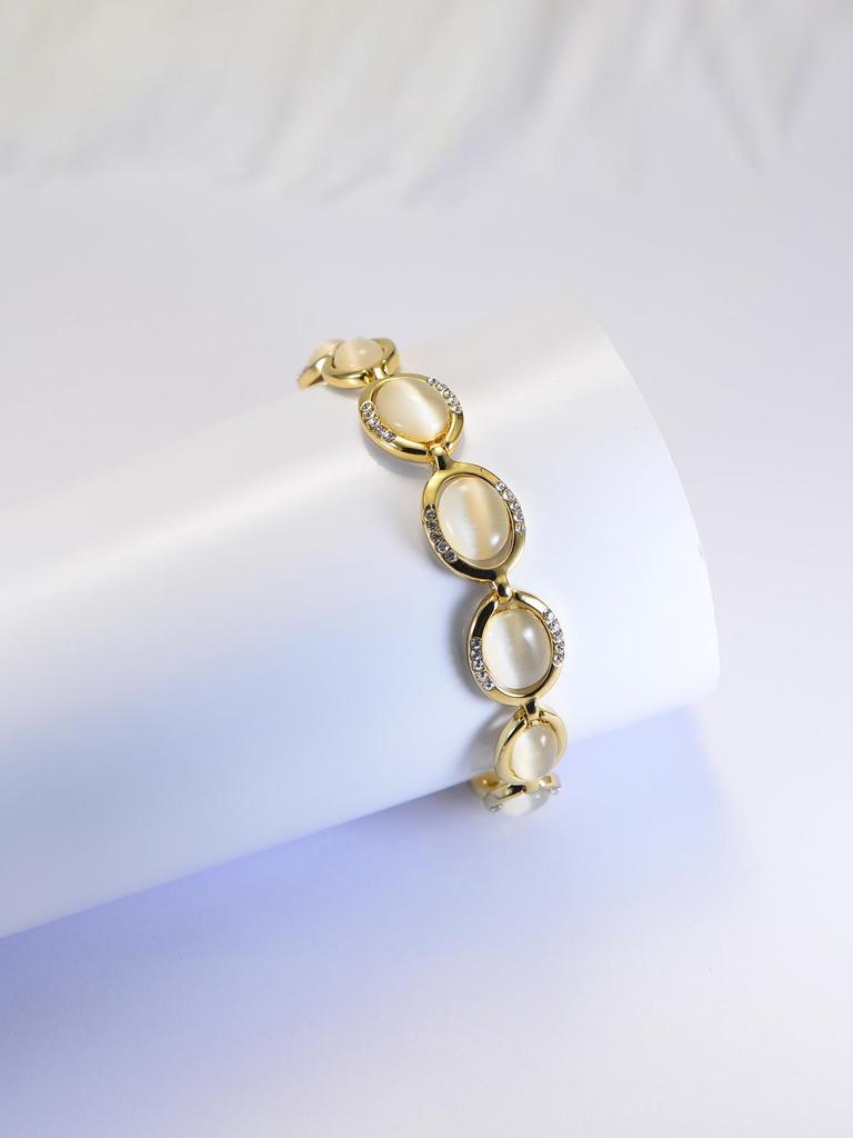 Женский браслет из розового золота 18 карат с камнем «кошачий глаз»