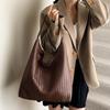Retro Portable Bucket Bag Women's Autumn and Winter New Large-capacity Woven Shoulder Bag Commuter Tote Bag