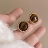 Женские серьги Мурад Тигровый глаз Камень Круглые витые серьги Женский высокий уровень Чувство ниши Дизайн Легкая роскошная сотня с серьгами для поездок на работу