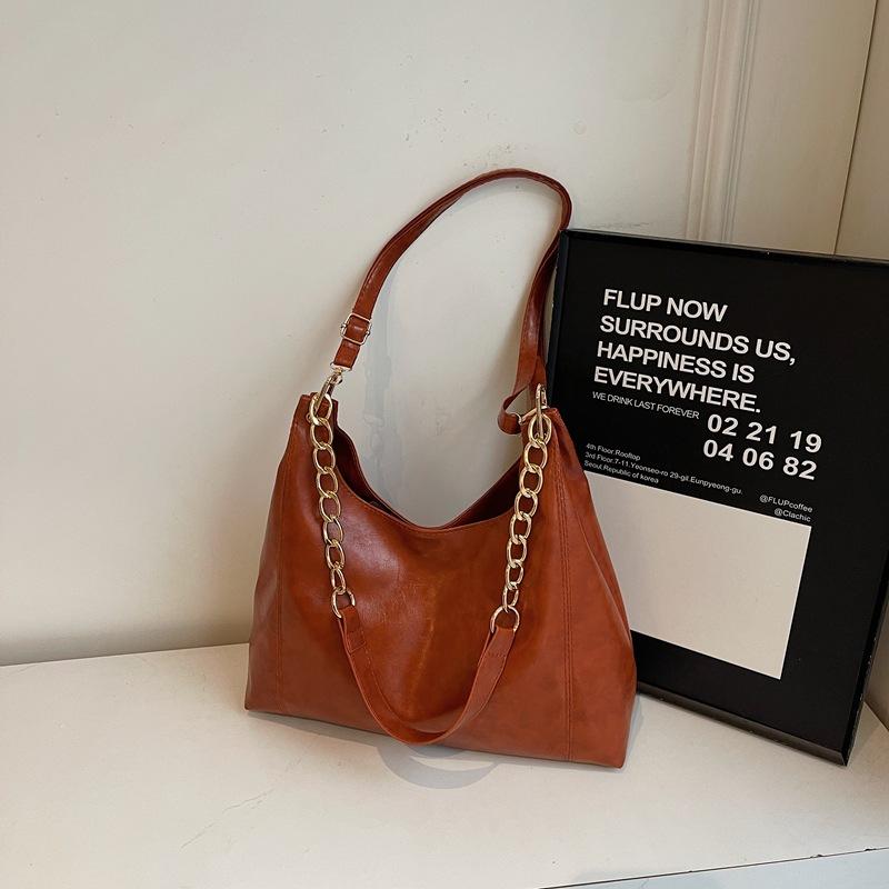 Сумка большой вместимости женская 2025 новая модная ретро нишевая на плечо мессенджер текстурная для通勤 женская сумка-тоут