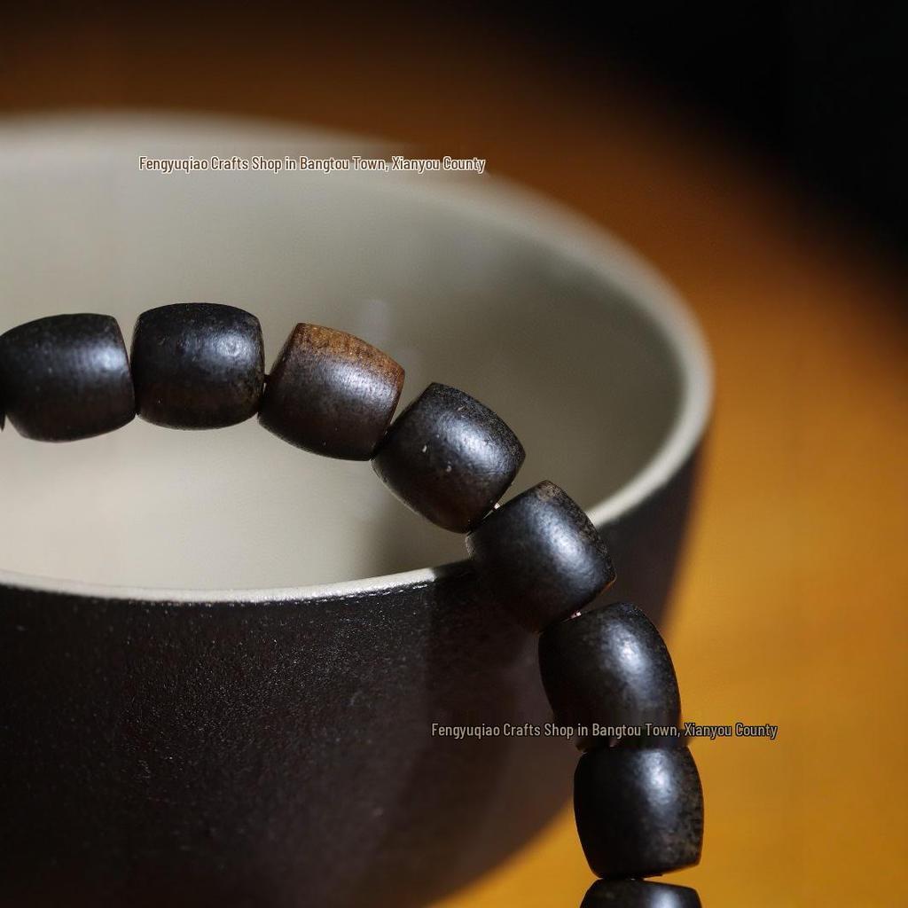 Agarwood Black Qinan High Oil Sinking Bracelet: 108 Bead Buddhist Rosary with Round and Barrel Beads, High-Quality Woody Hand Jewelry.