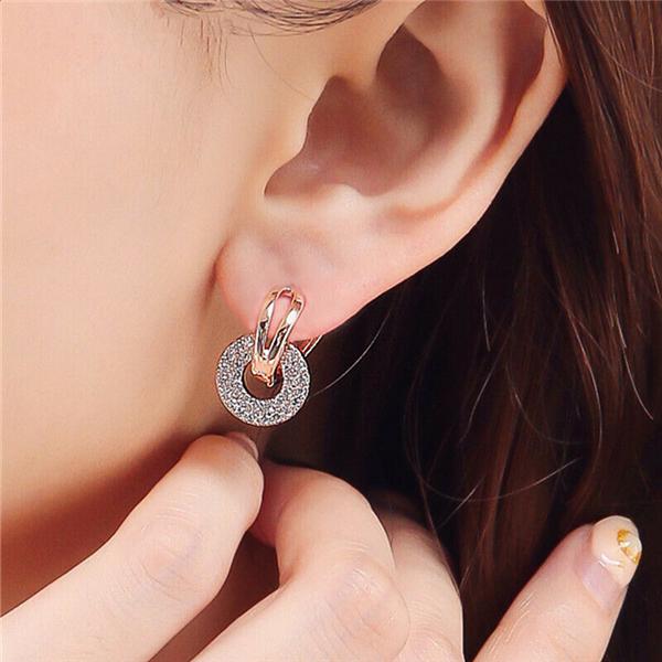 Круглые серьги с топазом