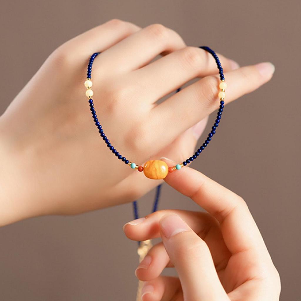 Натуральный лазурит и янтарь, бусины-рисинки, чокер