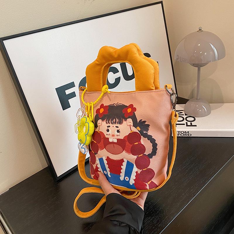 2025 Трансграничная мультяшная сумка-граффити: Нишевый дизайн Сумка-ведро на плечо и через плечо женская