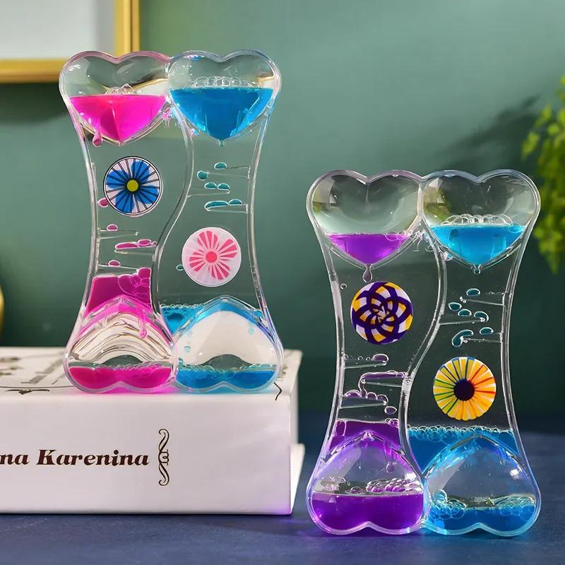 Новый продукт Слайд Масляная капля Декомпрессионная игрушка Акриловая жидкость Песочные часы Динамическая многоцветная утечка масла Домашнее украшение рабочего стола Подарок
