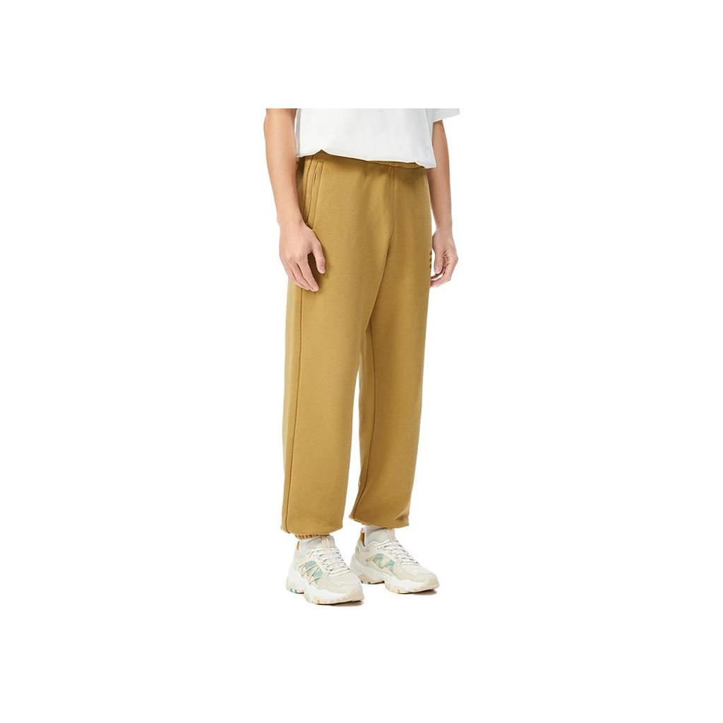 Li Ning CF Sports Fashion Series однотонные повседневные спортивные штаны с манжетами мужские низы коричневого цвета AKLSC95-2